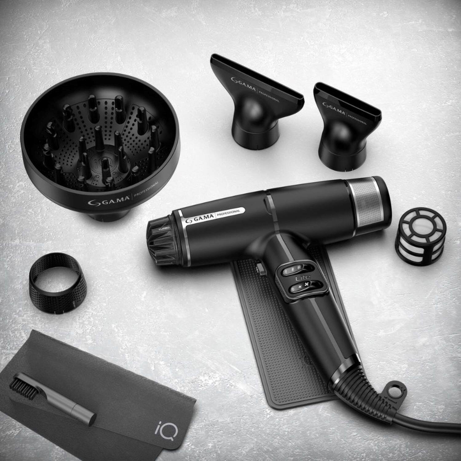 The image features a hair dryer and a hair brush, both of which are black in color. The hair dryer is placed on a table, while the hair brush is located nearby. The hair dryer is a professional-grade device, and the brush is designed for use with the dryer. The image also includes a close-up of the hair dryer and brush, showcasing their details.