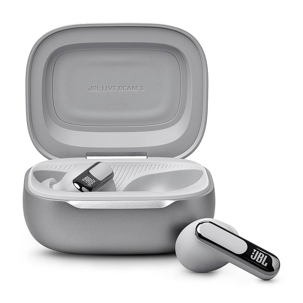 The image features a JBL Live Beam 3 Bluetooth speaker, which is a portable and wireless device. The speaker is placed inside a white case, and it is accompanied by a small earbud. The earbud is designed for personal use and can be easily stored in the case when not in use. The combination of the speaker and earbud offers a convenient and portable solution for listening to music or making calls on the go.