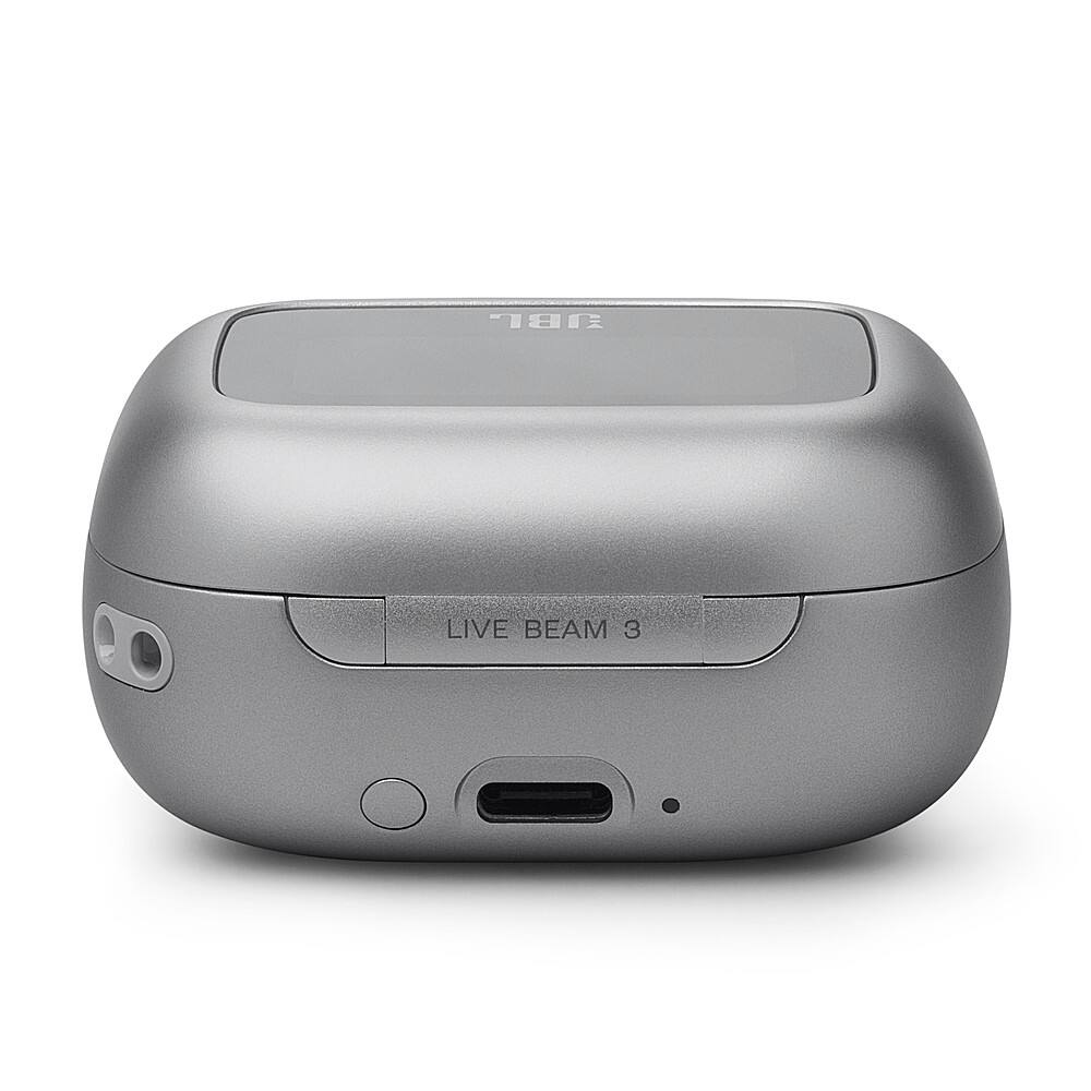 The image features a grey JBL Live Beam 3 speaker. It is a small, portable device that can be used for listening to music or making calls. The speaker has a sleek design and is likely to be a popular choice for those looking for a compact and convenient audio solution.