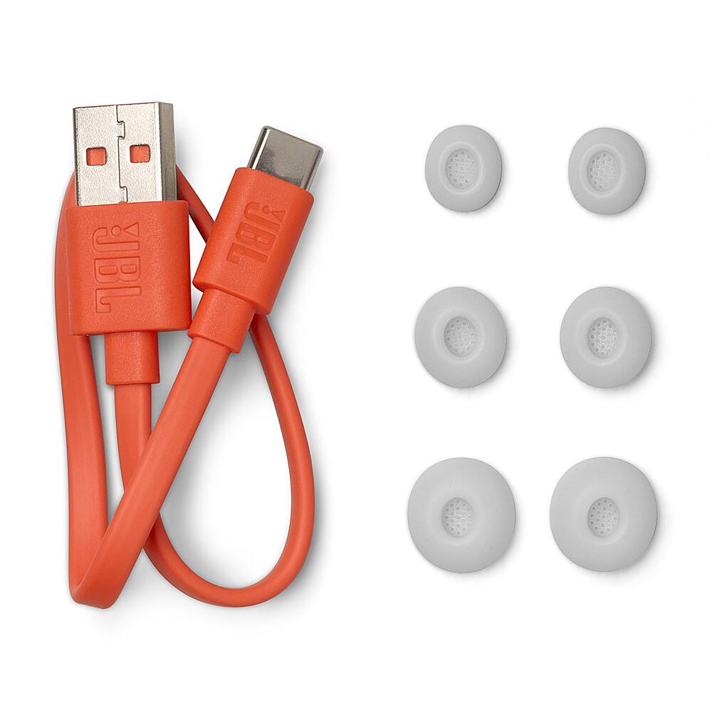 The image features a red USB cable with a white connector, along with a set of white buttons. The USB cable is connected to a device, and the white buttons are placed nearby. The cable is likely used for charging or data transfer purposes.