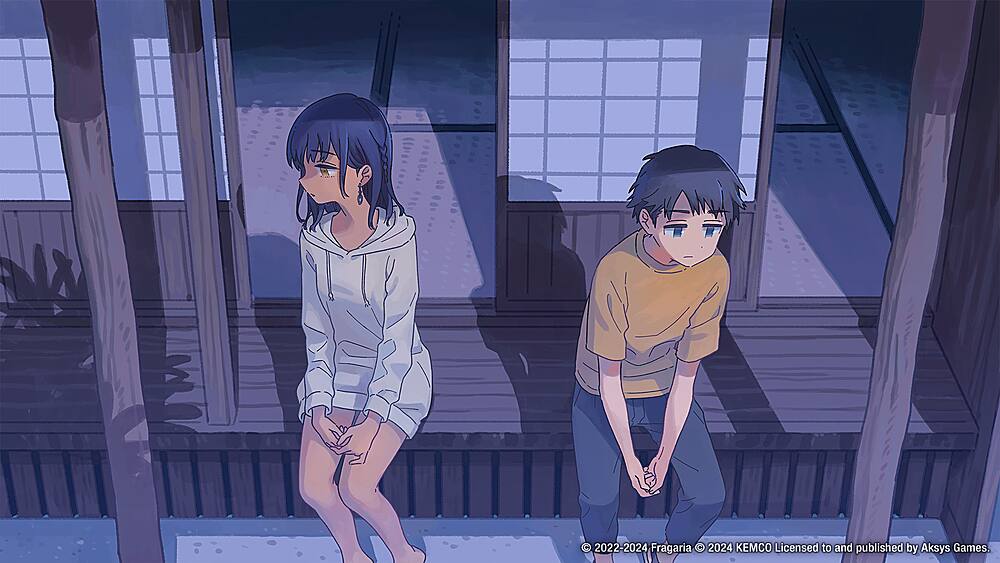 The image features a boy and a girl sitting on a bench. The girl is sitting on the left side of the bench, while the boy is sitting on the right side. The bench is located in front of a building, and the two individuals appear to be looking at something together. The scene is set at night, with the girl wearing a white sweater and the boy wearing a yellow shirt.