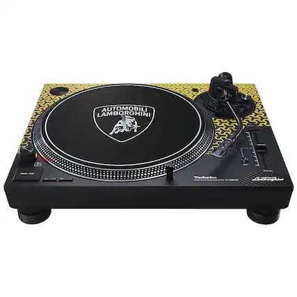 The image features a black and yellow turntable with the brand name "Automobili Lamborghini" on the top. The turntable is designed to resemble a sports car, adding a unique and stylish touch to the device. The turntable is placed on a stand and has a black and yellow color scheme, which complements the Lamborghini branding. The turntable is equipped with a stylus, ready for use.