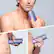 The image shows a man shaving his chest hair with an electric razor. He is holding the razor in his hand and appears to be focused on the task. The man is shirtless, which allows him to comfortably shave his chest hair. The image captures a moment of personal grooming and self-care.