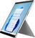 The image features a large tablet computer with a blue background and a variety of icons displayed on the screen. The tablet is placed on a stand, making it stand out prominently in the scene. The icons on the screen are organized in a way that showcases the different features and functions of the tablet, likely to demonstrate its capabilities and ease of use.