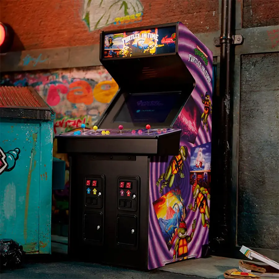 The image features a purple arcade machine with a colorful design, likely a Teenage Mutant Ninja Turtles game. The machine is placed next to a wall, and there is a trash can nearby. The machine is decorated with various buttons, and the game appears to be a popular choice for arcade enthusiasts.