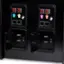 The image features two black boxes with slots for coins. The boxes are labeled with the numbers 1, 2, and 3, and they accept 25 cent coins. The slots are designed to accept coins of different denominations, making it convenient for users to pay for various services or products.
