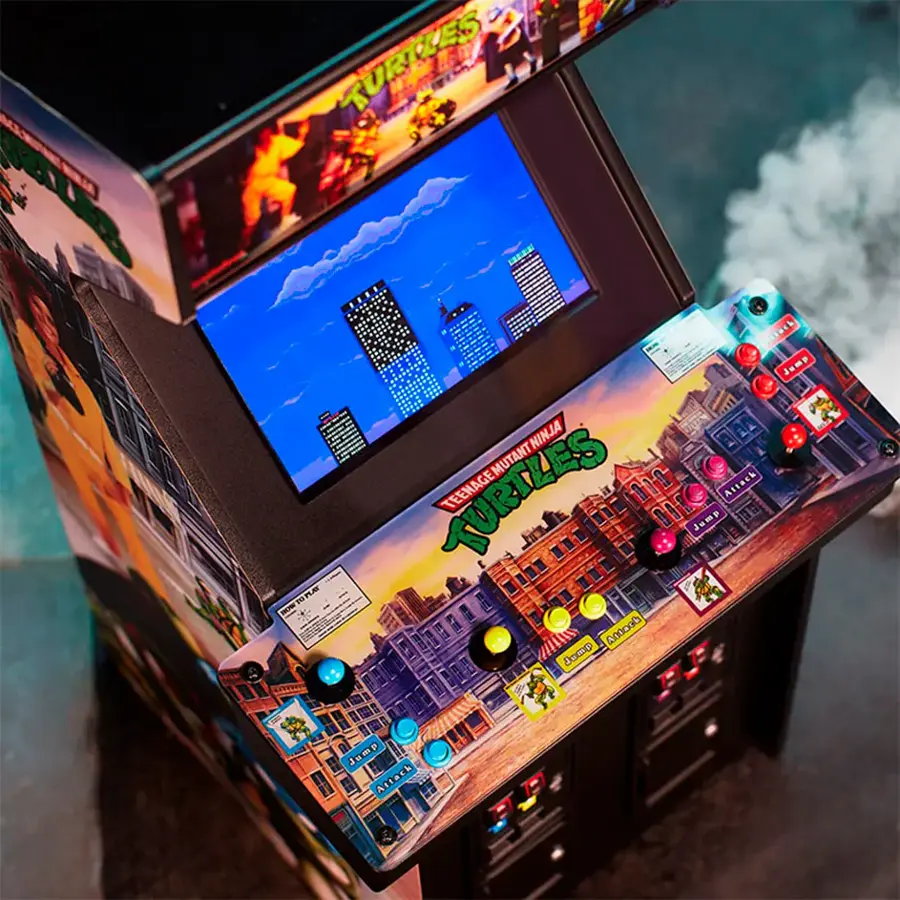 The image features a Teenage Mutant Ninja Turtles arcade machine with a large screen. The machine has a variety of buttons and a joystick, allowing players to control the game. The game is set in a city, with the Turtles as the main characters. The machine is designed to be an interactive and engaging experience for players, offering a fun and immersive gaming experience.