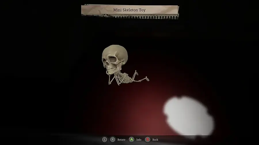 The image features a skeleton toy that is being displayed on a screen. The skeleton is shown in a dark background, and there is a cloud in the background as well. The skeleton is positioned in the center of the screen, and it appears to be a part of a video game or a computer program. The skeleton is surrounded by a red background, which adds to the overall visual effect.