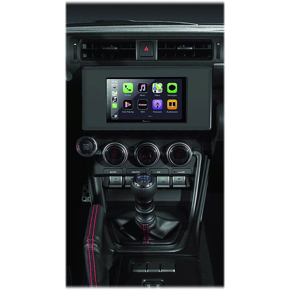 The image shows the dashboard of a car with a screen displaying various icons. The screen is placed in the center of the dashboard, and there are multiple buttons surrounding it. The car appears to be a sports car, and the dashboard is equipped with a touch screen, which is a common feature in modern vehicles. The screen is displaying icons for different functions, such as music, navigation, and other car-related controls. The car's interior is dark, which emphasizes the brightness of the screen and the icons displayed on it.