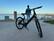 Alt View 19. OKAI - LyteCycle EB60 Minimalist Fitness Step-through e-Bike w/ up to 62 miles Max Operating Range and 20 MPH Max Speed - Matte Black.