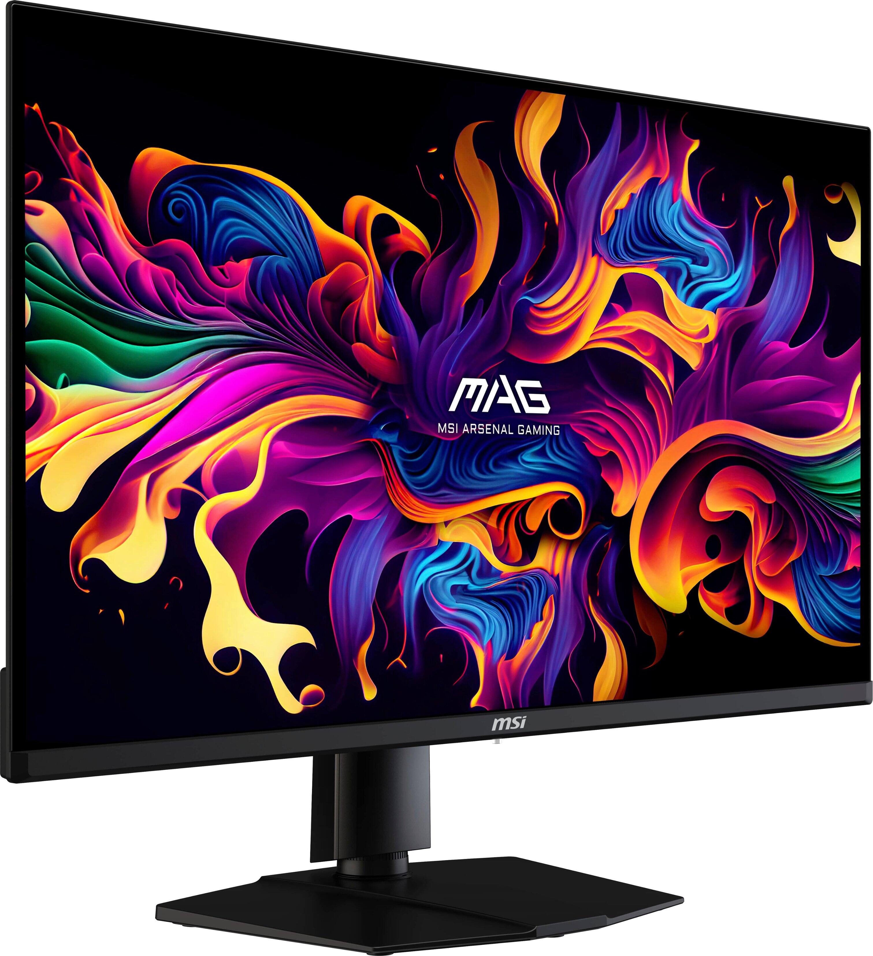 The image features a monitor with a vibrant and colorful background, showcasing the MAG MSI ARSENAL GAMING brand. The monitor is black and has a stand, which is placed on a white background. The vivid colors and design of the background make the monitor stand out and showcase its gaming capabilities.