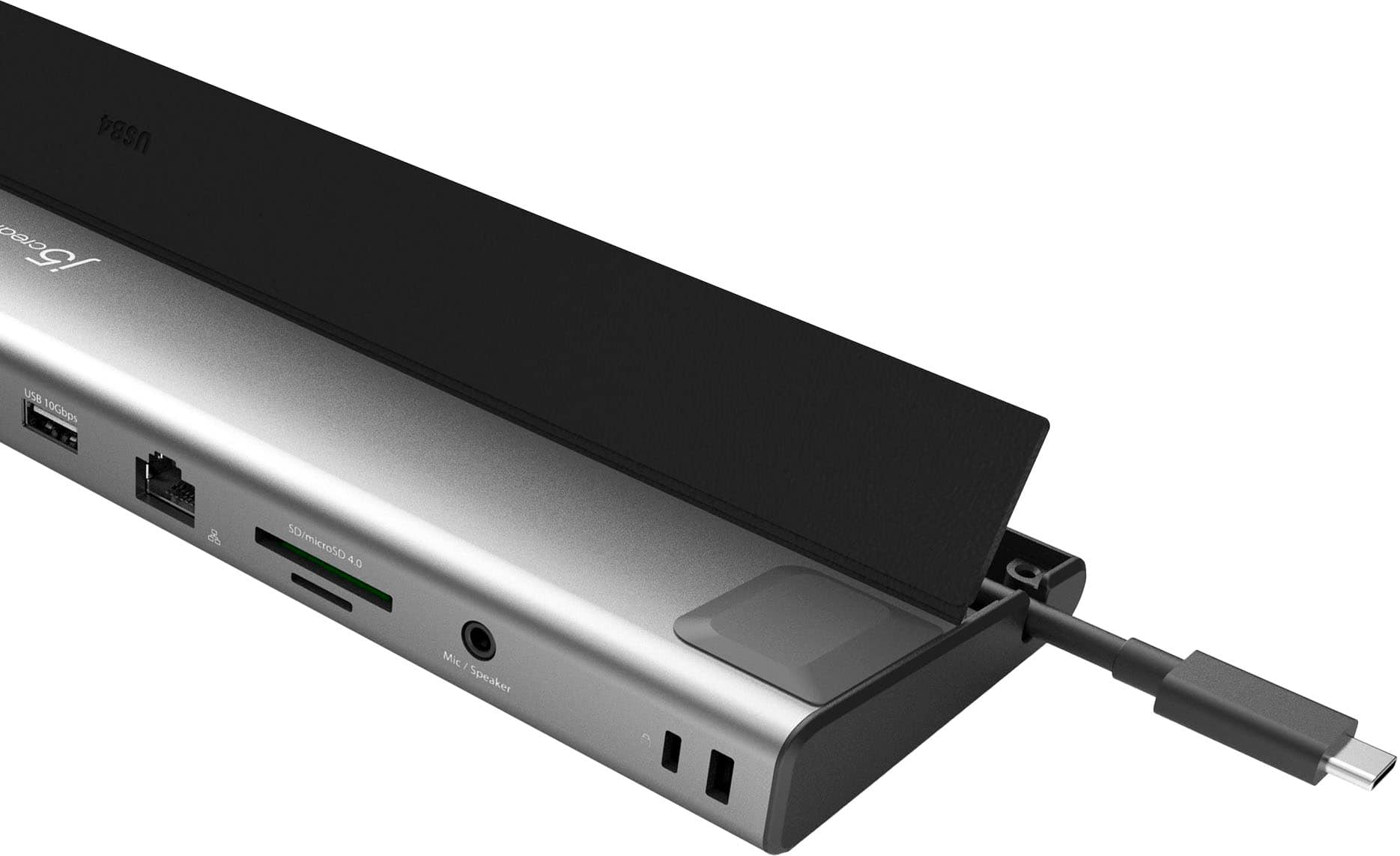 The image features a laptop docking station with a USB cable plugged into it. The station is designed to connect the laptop to other devices, such as a monitor or a printer, for a more efficient and convenient workspace. The USB cable is connected to the laptop, which is placed on top of the docking station. The station is made of a combination of black and silver materials, providing a sleek and modern appearance.