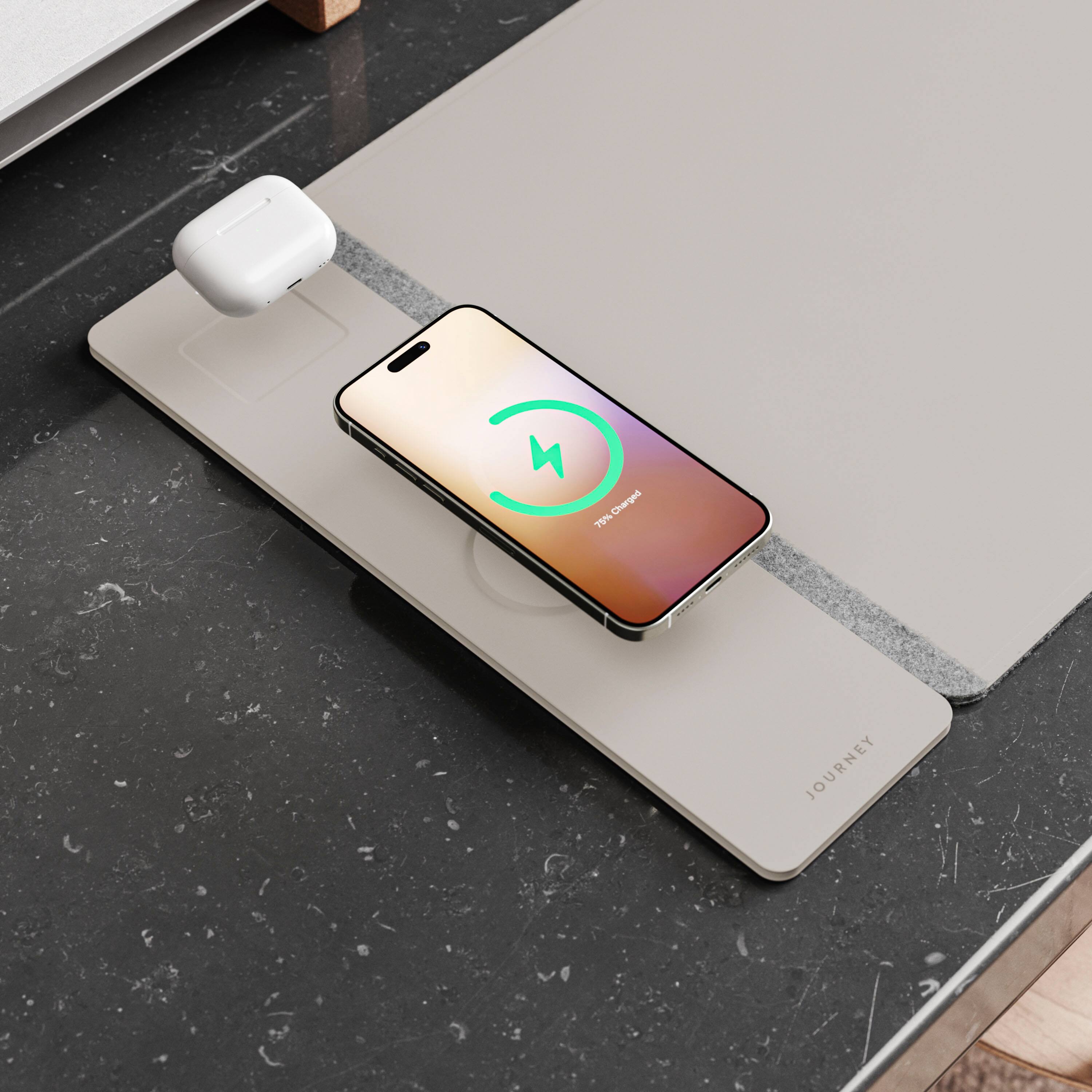 The image shows a cell phone placed on a charging station, indicating that it is currently charging. The phone is positioned in the center of the image, and the charging station is located on a table. The phone is displaying a battery charge of 75%, suggesting that it is almost fully charged. The image also features a power cord, which is connected to the charging station and the phone.