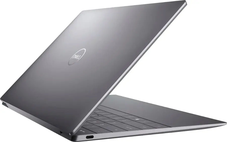 Laptop_Computers:

"Dell laptop computer with a silver case and a black keyboard. The laptop is open and ready for use. The keyboard is visible and the laptop is sitting on a white background."