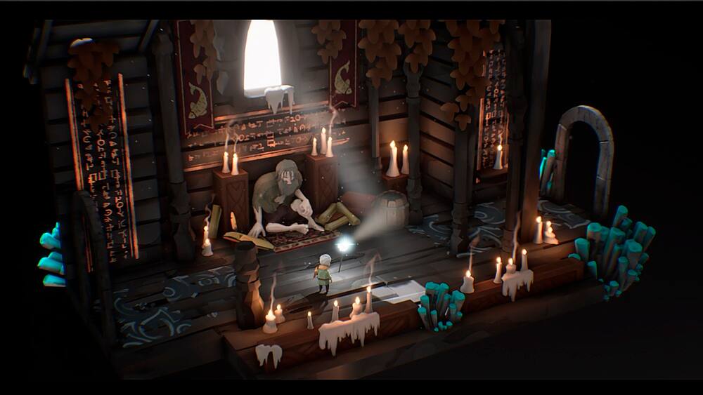 The image features a small cabin with a person sitting inside, surrounded by a variety of candles. There are at least 12 candles visible in the scene, with some placed near the person and others scattered around the cabin. The person appears to be reading a book, creating a cozy and intimate atmosphere within the cabin.