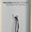 The image features a cable concealer with a black cord attached to it, which is mounted on a wall. The text "Indluced bracket attaches securely to the wall" is displayed, emphasizing the secure attachment of the bracket to the wall.