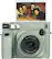The text on the image reads "instax WIDE 400 SELF TIMER LENS INSTAX 95mm -w60 RANGE FOCUS."