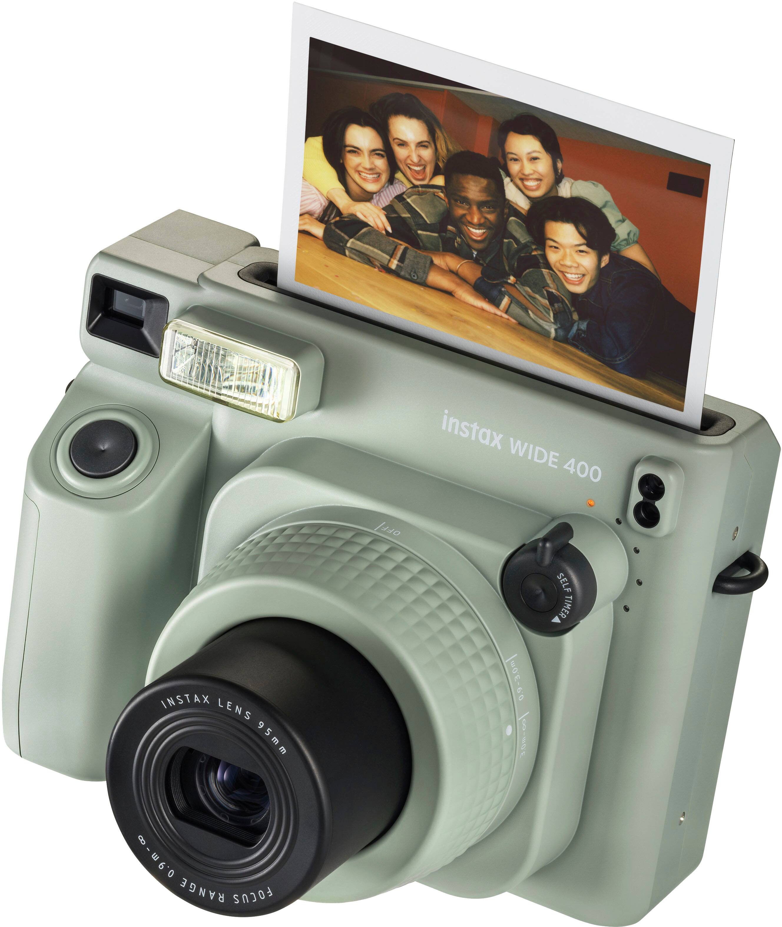 The text on the image reads "instax WIDE 400 fero INSTAX LENS S.- [OP 1 SELF H 09.-00 RANGE FOCUS."