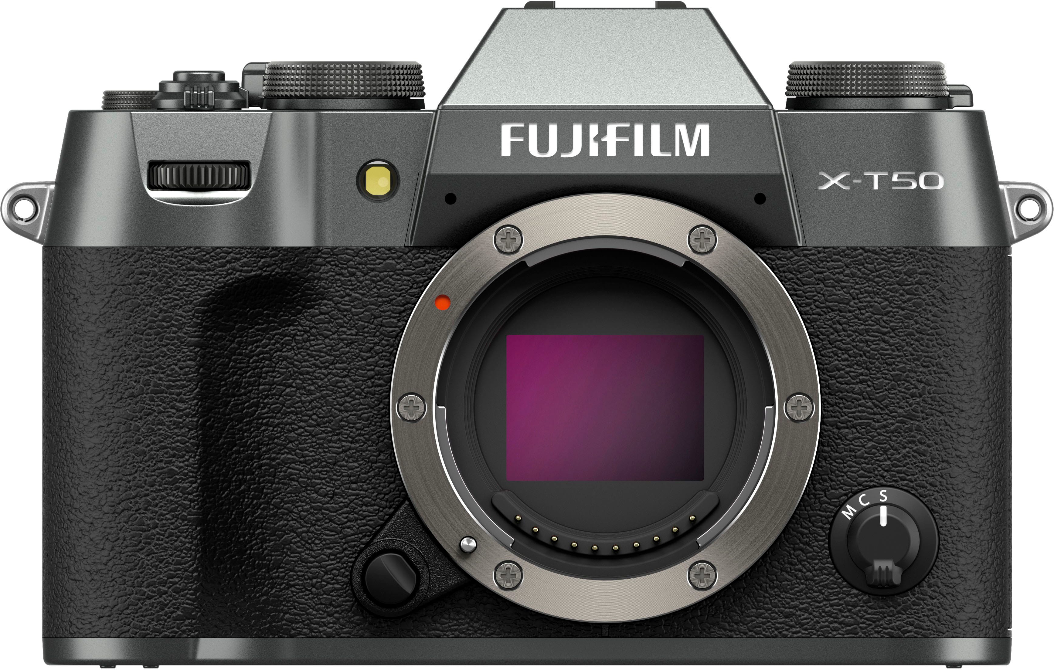 The image features a FUJIFILM X-T50 camera with a large lens. The camera is black and silver in color, and it has a purple viewfinder. The camera is positioned in a way that it is facing the viewer, showcasing its design and features.