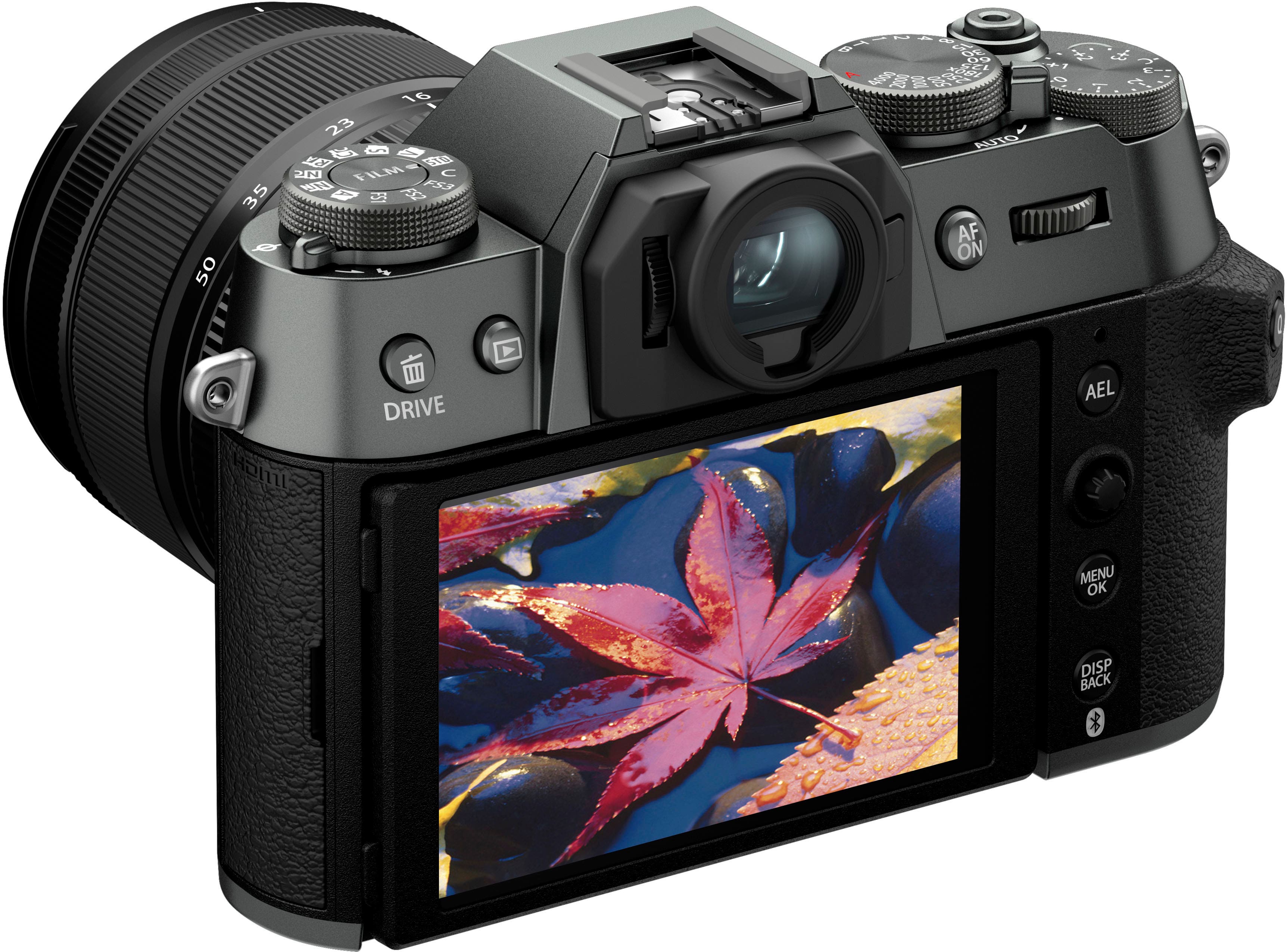 The image features a digital camera that is turned on and ready to use. The camera has a large screen on the back, which is likely used for viewing photos and videos. The camera is equipped with a lens and a viewfinder, making it suitable for capturing high-quality images and videos. The camera is also equipped with a flash, which can be used to illuminate subjects in low-light conditions. The camera is designed for professional use, as indicated by its advanced features and capabilities.
