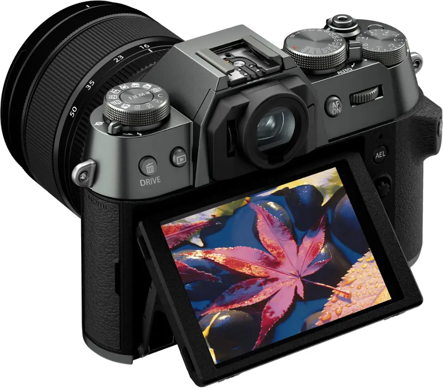 The image features a digital camera with a screen on the back, which is likely used for displaying images or settings. The camera has a large lens, which is a key component for capturing high-quality photos. The camera is designed for professional use, as indicated by its advanced features and functionality.