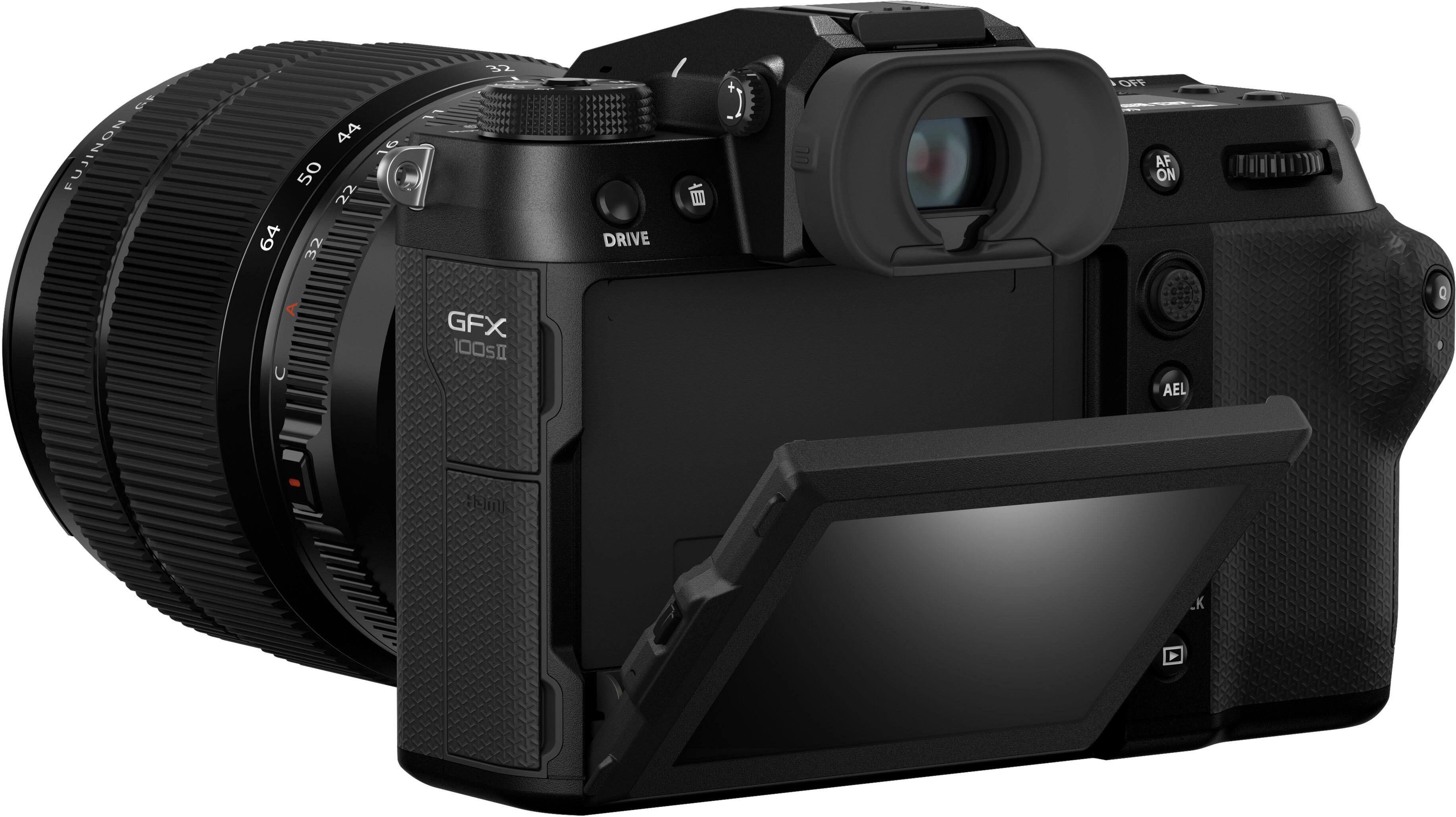 The image features a large digital camera with a lens attached to it. The camera is black and has a viewfinder on the top. The lens is large and prominent, making it the focal point of the image. The camera is likely designed for professional use, given its size and features.