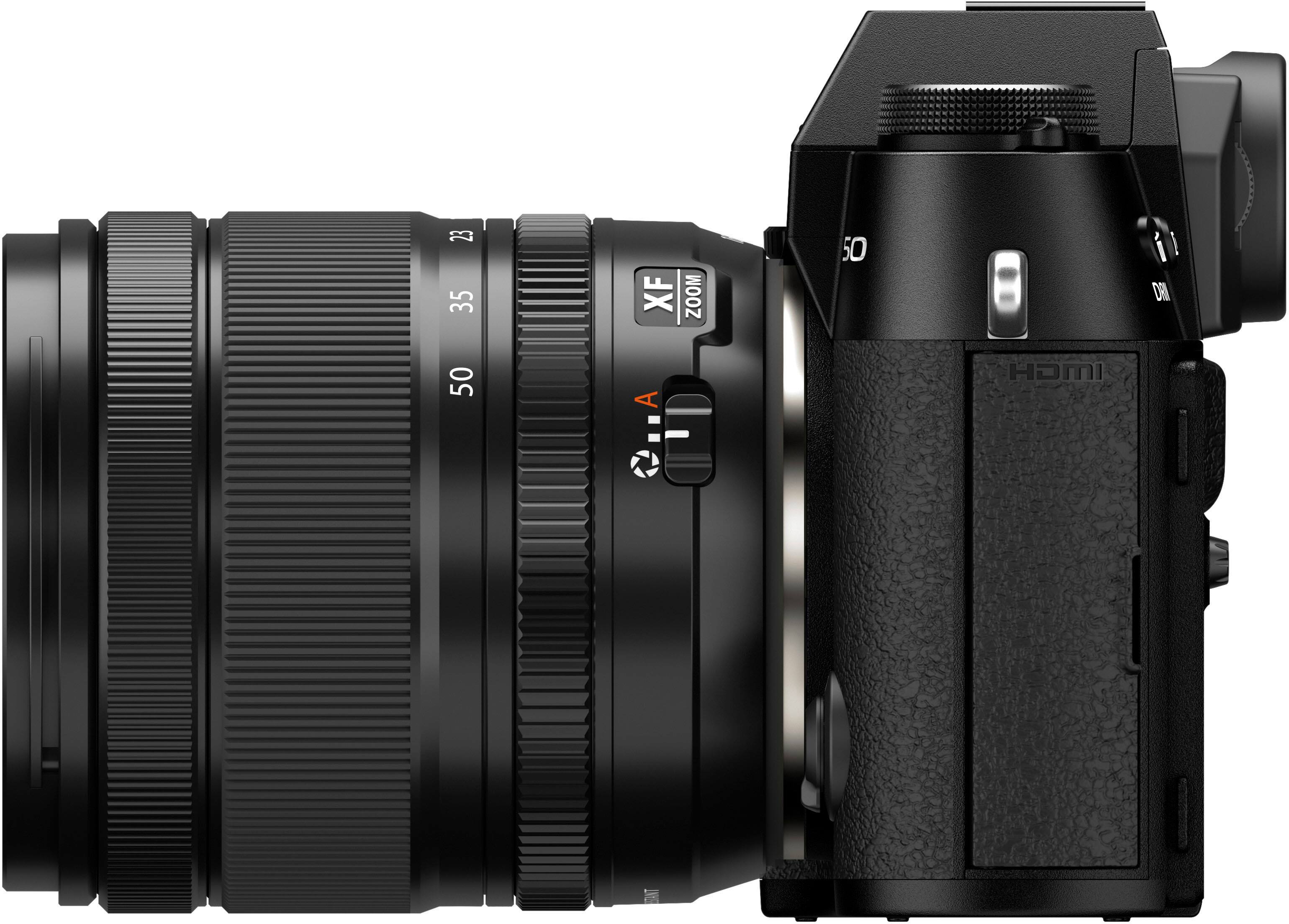 The image features a close-up of a black camera lens, which is a part of a digital camera. The lens is large and occupies a significant portion of the image. The camera is likely designed for professional use, given its size and features. The lens is positioned in front of a white background, which provides a clean and uncluttered backdrop for the image.