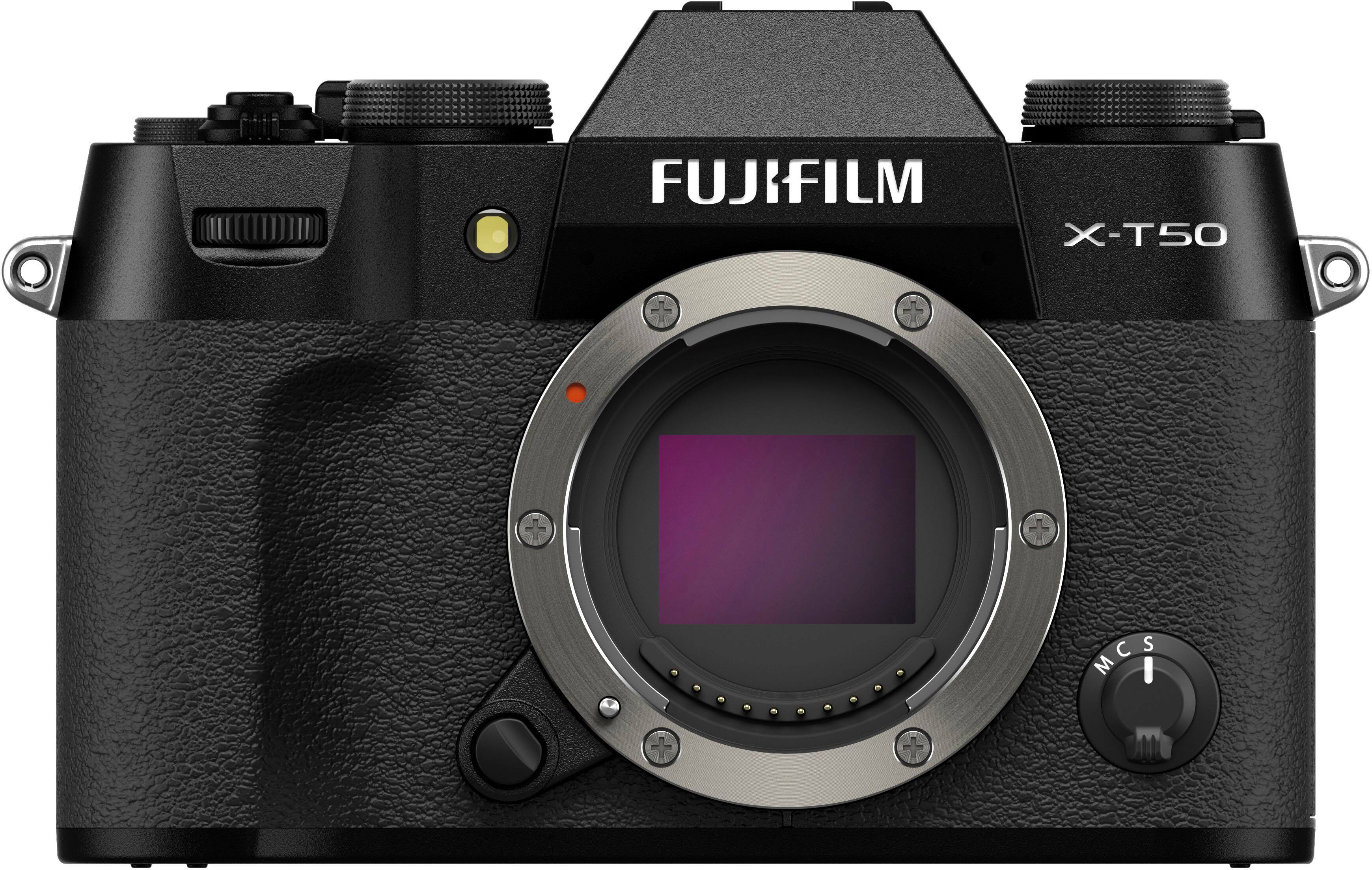 The image features a black FUJIFILM X-T50 camera with a large lens. The camera is positioned on a white background, making it stand out. The camera is equipped with a viewfinder and a flash, and it appears to be a high-quality digital camera.