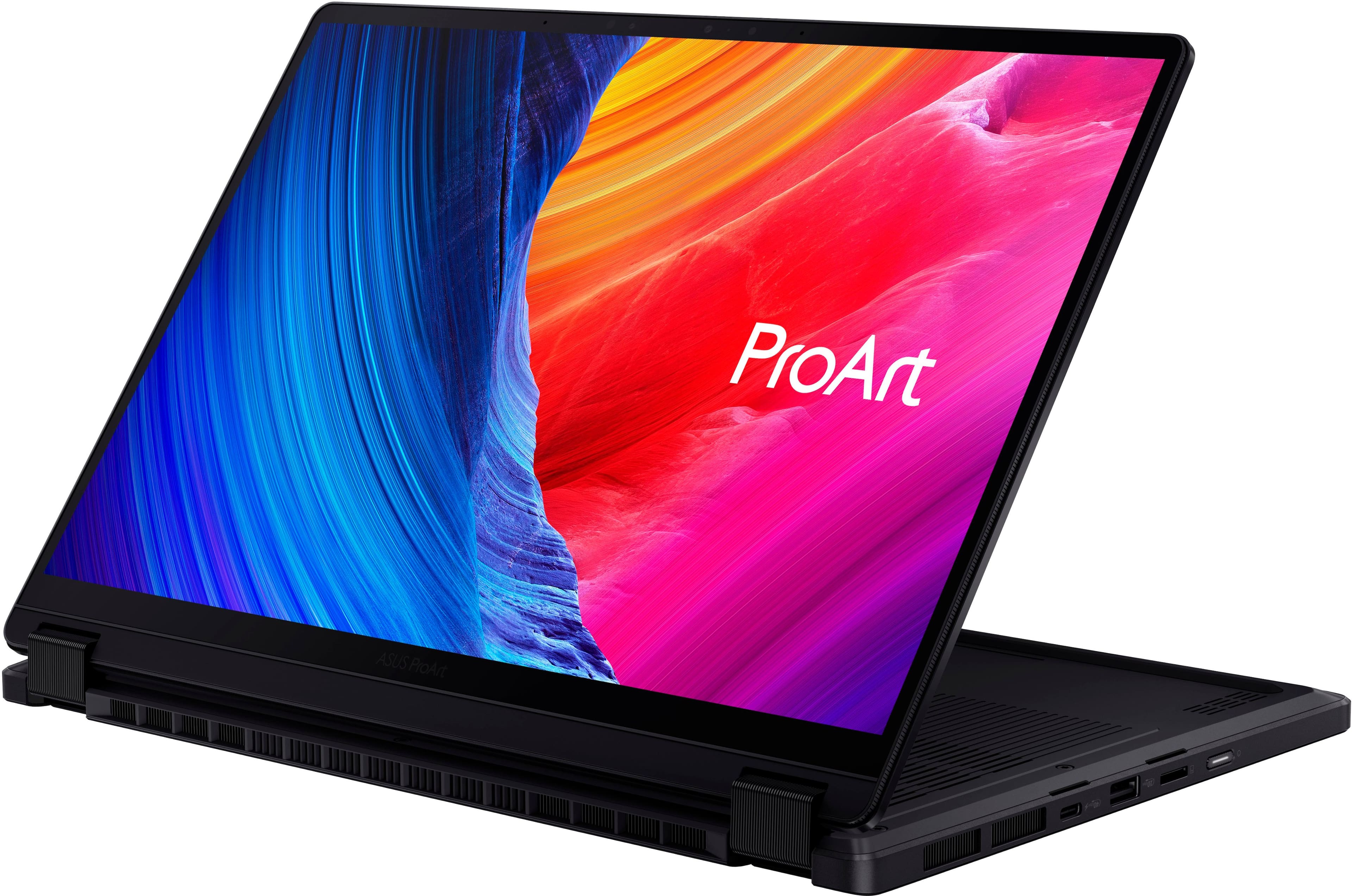 The image features a laptop with a colorful background, likely a wallpaper, and the words "ProArt" displayed on the screen. The laptop is open, showcasing the vibrant display.