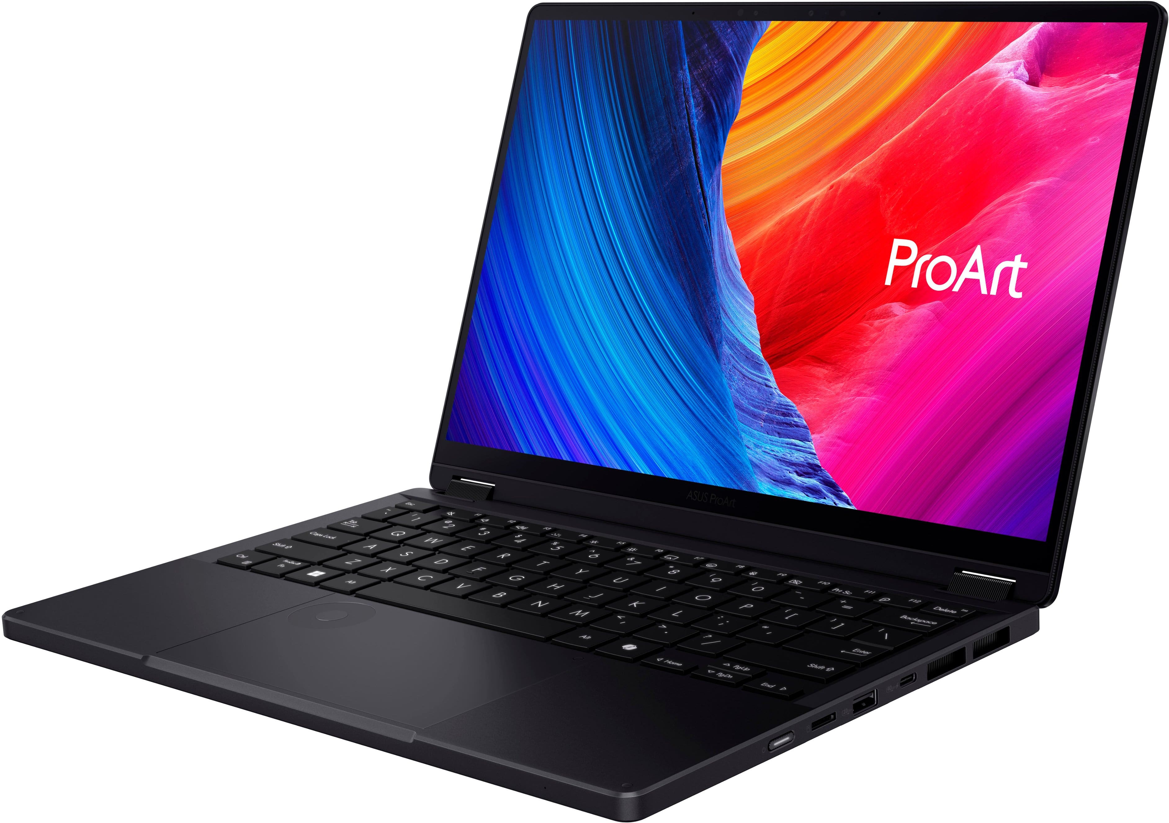 The image features a laptop computer with a colorful background, which has the word "ProArt" displayed on it. The laptop is open and ready for use.