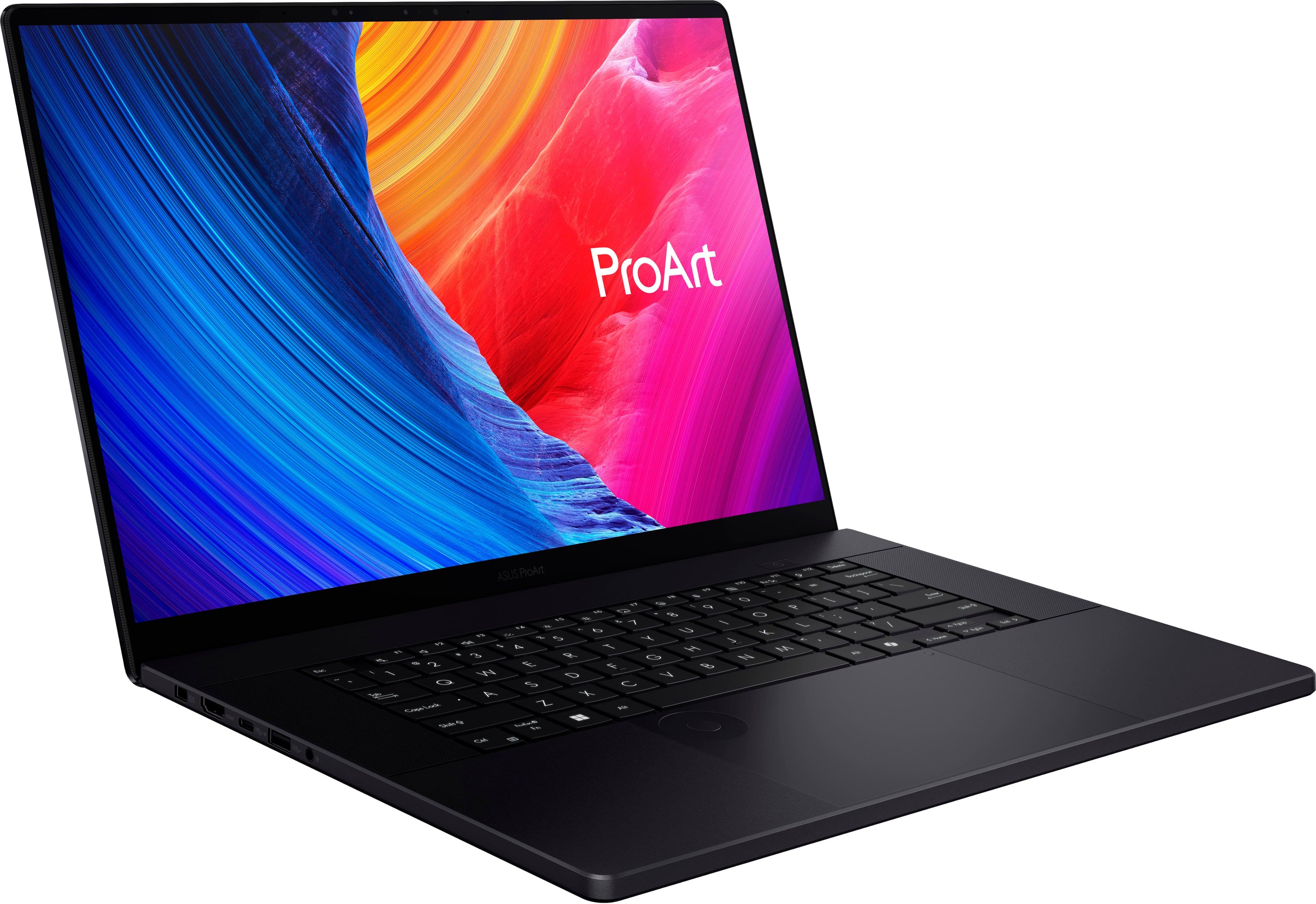 The image features a black laptop with a colorful background, which is likely a wallpaper. The laptop is open, and the screen displays the word "ProArt" in white text. The laptop is positioned against a white background, making the vibrant colors of the wallpaper stand out.