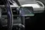 The image shows a car's dashboard with a cell phone mounted on it. The phone is displaying a map, showing the route from Moorpark to Oxnard. The map also shows the distance and estimated time of arrival at the destination. The car's steering wheel is visible in the foreground, and the dashboard is equipped with a GPS system.