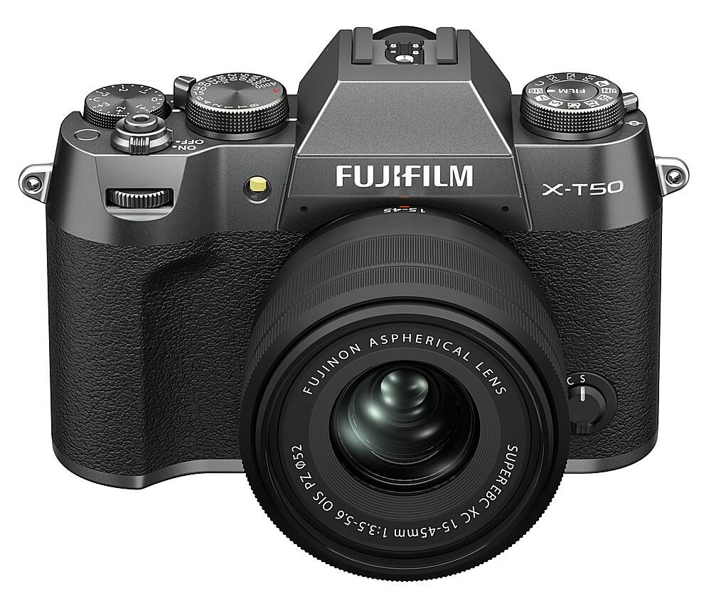 The image features a close-up of a Fujifilm camera lens. The lens is described as an aspherical Fujinon lens, which is a type of lens designed to correct distortions and provide better image quality. The lens has a focal length of 15-45mm, making it suitable for various photography needs. The camera is likely a part of the X-T50 model, as indicated by the presence of the Fujifilm logo on the lens.