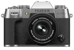 The image features a FUJIFILM X-T50 camera with an aspherical FUJINON lens. The lens has a focal length of 15-45mm and an aperture of 1:3.5-5.6. The camera is designed for capturing high-quality images and is suitable for various photography needs.