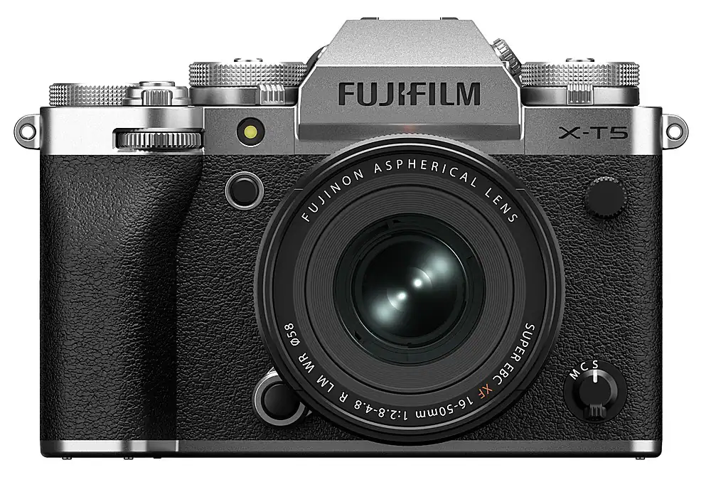 The image features a close-up of a FUJIFILM camera with an aspherical FUJINON lens. The camera is designed for the X-T5 model, and it has a 58mm super wide-angle lens with a 1:2.8-4.8 aperture. The camera is equipped with a 16-50mm MCS lens, making it suitable for various photography needs.