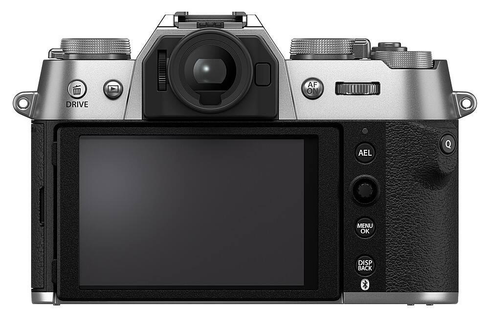 The image features a digital camera with a large screen and a viewfinder. The camera has a black and silver color scheme, and it is equipped with a lens. The camera is designed for taking pictures and recording videos, and it is likely used for various photography purposes. The camera's screen is currently blank, indicating that it is not in use or displaying any content at the moment.
