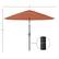 The image shows a large umbrella with a pole and a black base. The umbrella is open, and it is positioned above a black pole. The umbrella has a brown color, and it is placed in a white background. The umbrella is quite large, as it spans the entire image from left to right.