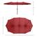 The image features a large red umbrella with a handle, which is open and ready for use. The umbrella is positioned above a smaller red umbrella, which is also open. The two umbrellas are placed next to each other, creating an interesting visual effect. The image also includes a ruler, which measures 15 feet in length, indicating the size of the larger umbrella.