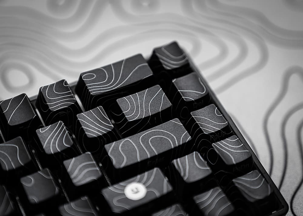 The text on the image is in Spanish, so I cannot group and correct the text. However, I can provide the English translation for the given text: "Del Enfer PgUp PgDn". This text is a combination of two phrases in Spanish. "Del Enfer" means "From Hell," and "PgUp PgDn" are the keyboard shortcuts for the "Page Up" and "Page Down" keys, respectively.