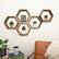 Angle. TRINITY - DRAKESTONE | Hexagon Shelves | 5-Pack | Walnut - Walnut.