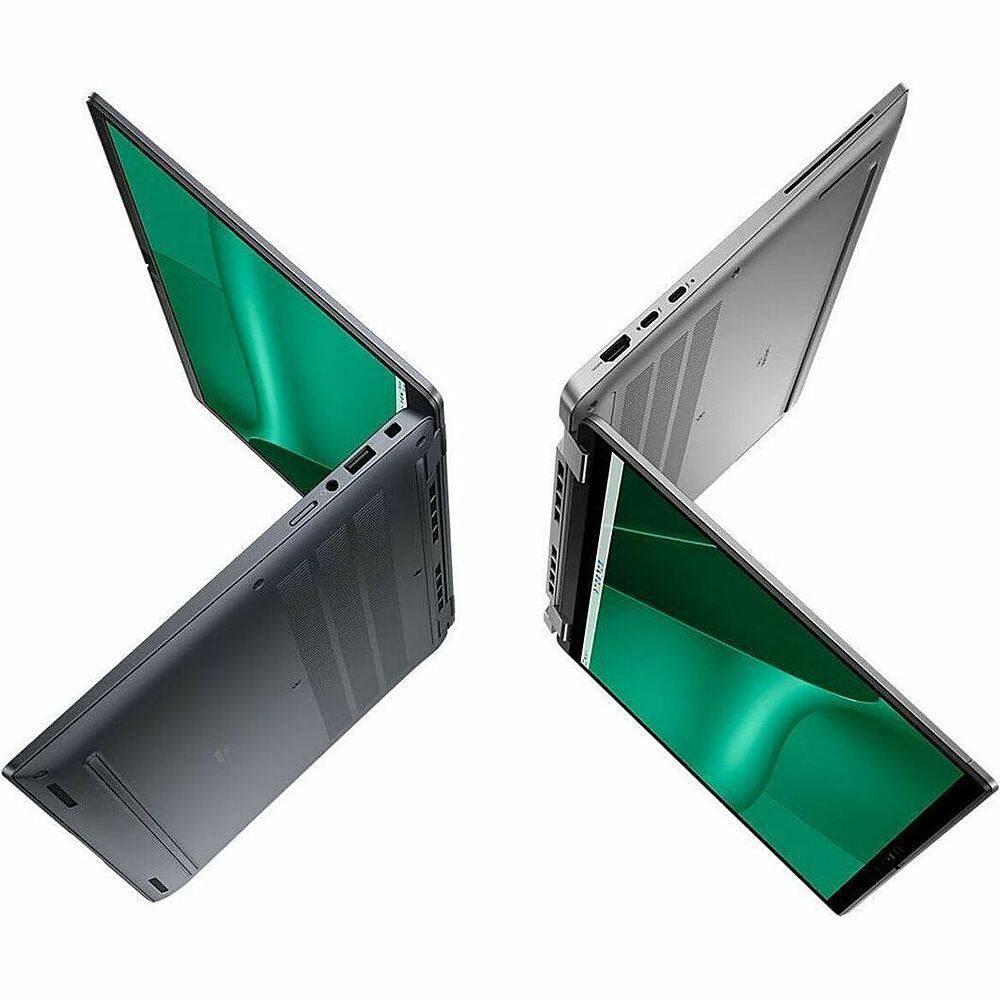 The image features two laptops, one with a green screen and the other with a black screen. Both laptops are open and placed next to each other. The green laptop is on the left side of the image, while the black laptop is on the right side. The laptops are positioned in such a way that they appear to be facing each other.