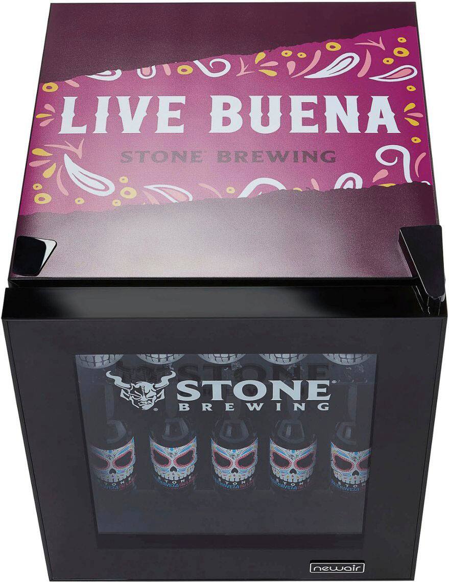 Live Buena Stone Brewing is a popular beer brand that offers a variety of flavors. The image showcases a display case containing multiple bottles of Live Buena Stone Brewing beer. The display case is designed to protect the bottles and showcase the brand's products. The bottles are arranged in a visually appealing manner, making it easy for customers to choose their preferred beer. The display case is a great way to attract customers and promote the brand's products.