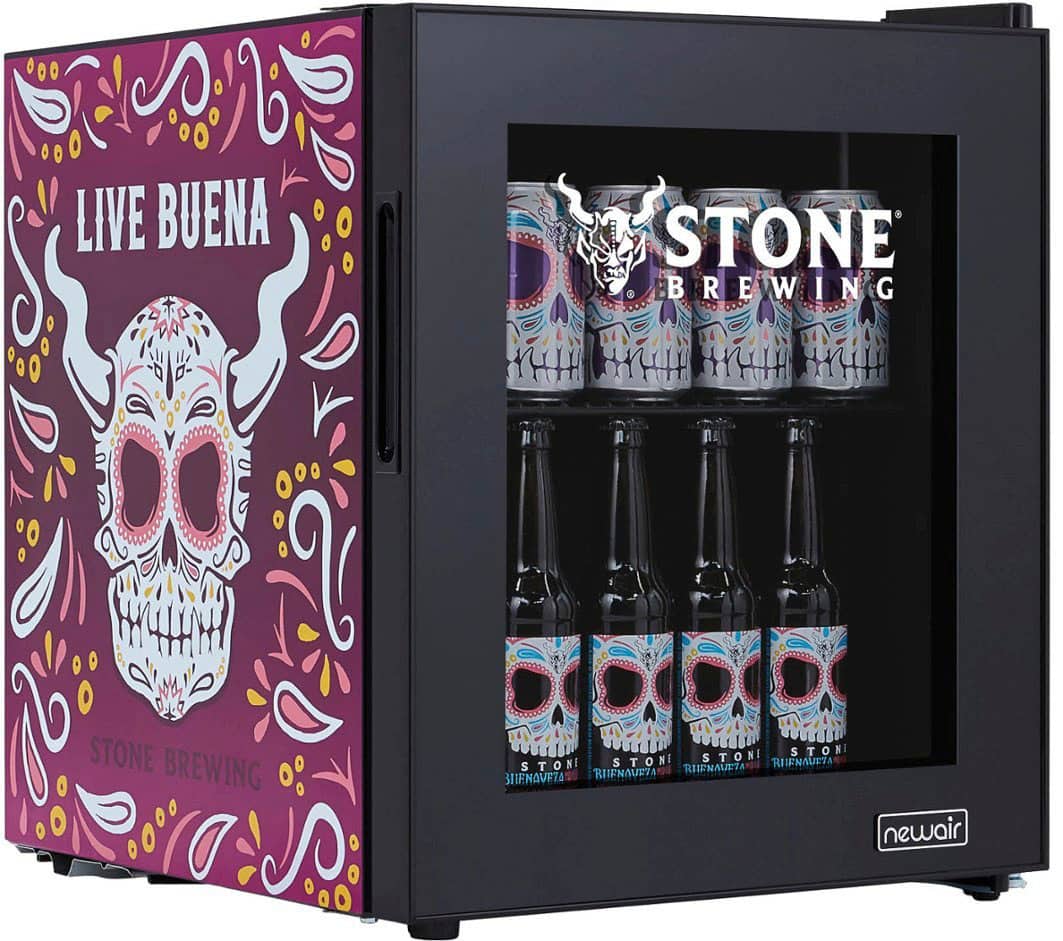 The image features a refrigerator with a vibrant purple and pink design, showcasing cans of beer from Stone Brewing. The refrigerator is filled with a variety of beer cans, which are displayed in a visually appealing manner. The cans are arranged in a way that highlights the different types of beer available, making it an attractive and functional addition to any setting.