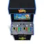 The image features a blue and black X-Men arcade machine, which is a video game console. The machine has a large screen that displays the game, and it is equipped with two joysticks for players to control the game. The X-Men game is a popular choice for arcade gaming, and it is likely to attract many players due to its exciting gameplay and engaging storyline.