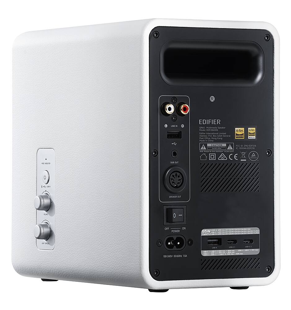 The image features a white and black Edifier speaker system. The speaker system has a black case and a silver faceplate. The speaker system is equipped with a variety of ports, including a USB port, a headphone jack, and an audio input. The speaker system also has a power button and a volume control. The image shows the back of the speaker system, which is white and black in color. The speaker system is designed to provide high-quality audio output, making it an excellent choice for music enthusiasts and home theater enthusiasts.