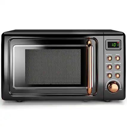 The text on the image reads "10 Mirro Power Express Clock/Defron Auto/Cooking Instant/Start Pause/Cancel." This suggests that the microwave has various features and functions, such as a clock, defrosting, auto cooking, instant cooking, and the ability to start, pause, and cancel cooking processes.