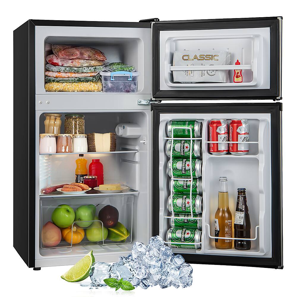 The image shows a refrigerator with its door open, revealing a variety of food and drinks. There are several bottles of beer, including Heineken, placed on the shelves. In addition to the beer, there are also multiple bottles of soda, such as Coca-Cola, and a variety of fruits, including apples and oranges. The refrigerator is stocked with a diverse selection of items, making it a well-stocked and convenient source of refreshments.