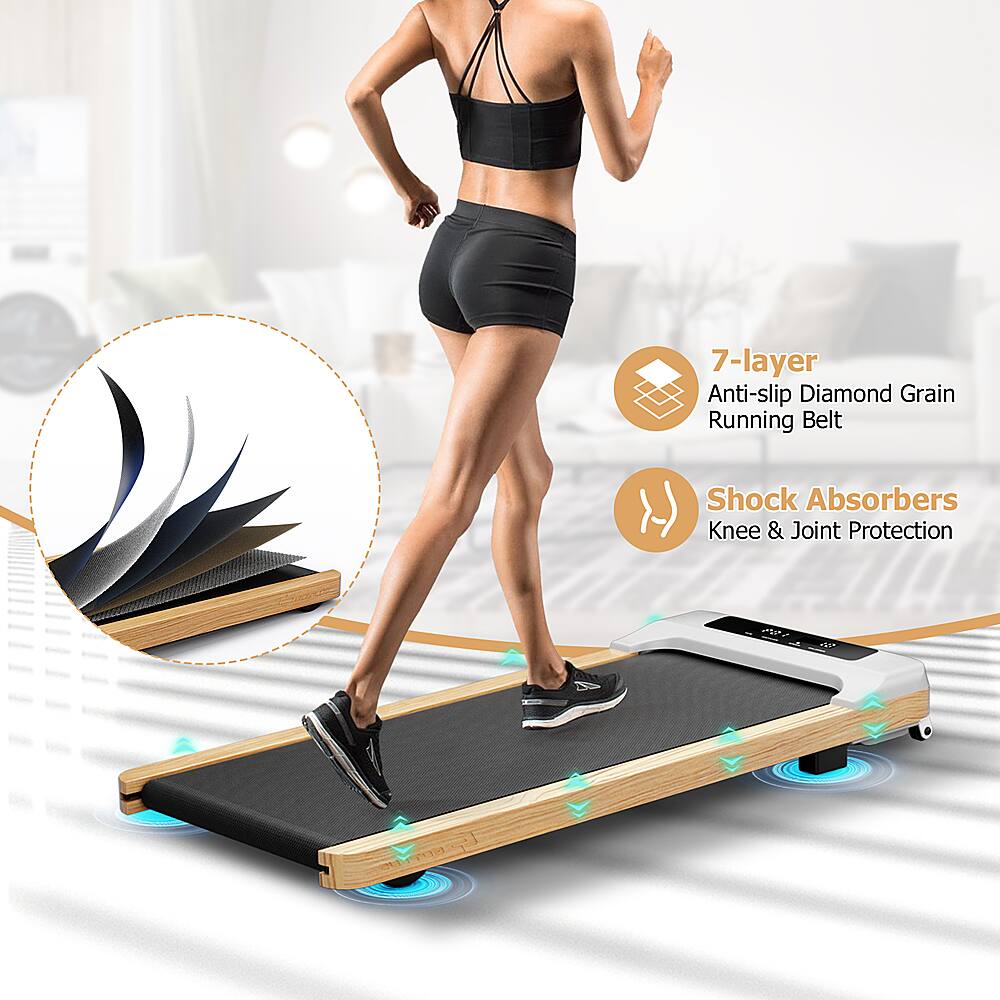 The text on the image is grouped as follows:

1. 7-layer Anti-slip Diamond Grain Running Belt: This is a feature of the treadmill belt, which provides better grip and prevents slipping.
2. Shock Absorbers: This feature is designed to reduce the impact on the user's joints and muscles, providing a more comfortable running experience.
3. Knee & Joint Protection: This feature is intended to protect the user's knees and joints from injury or strain during exercise.