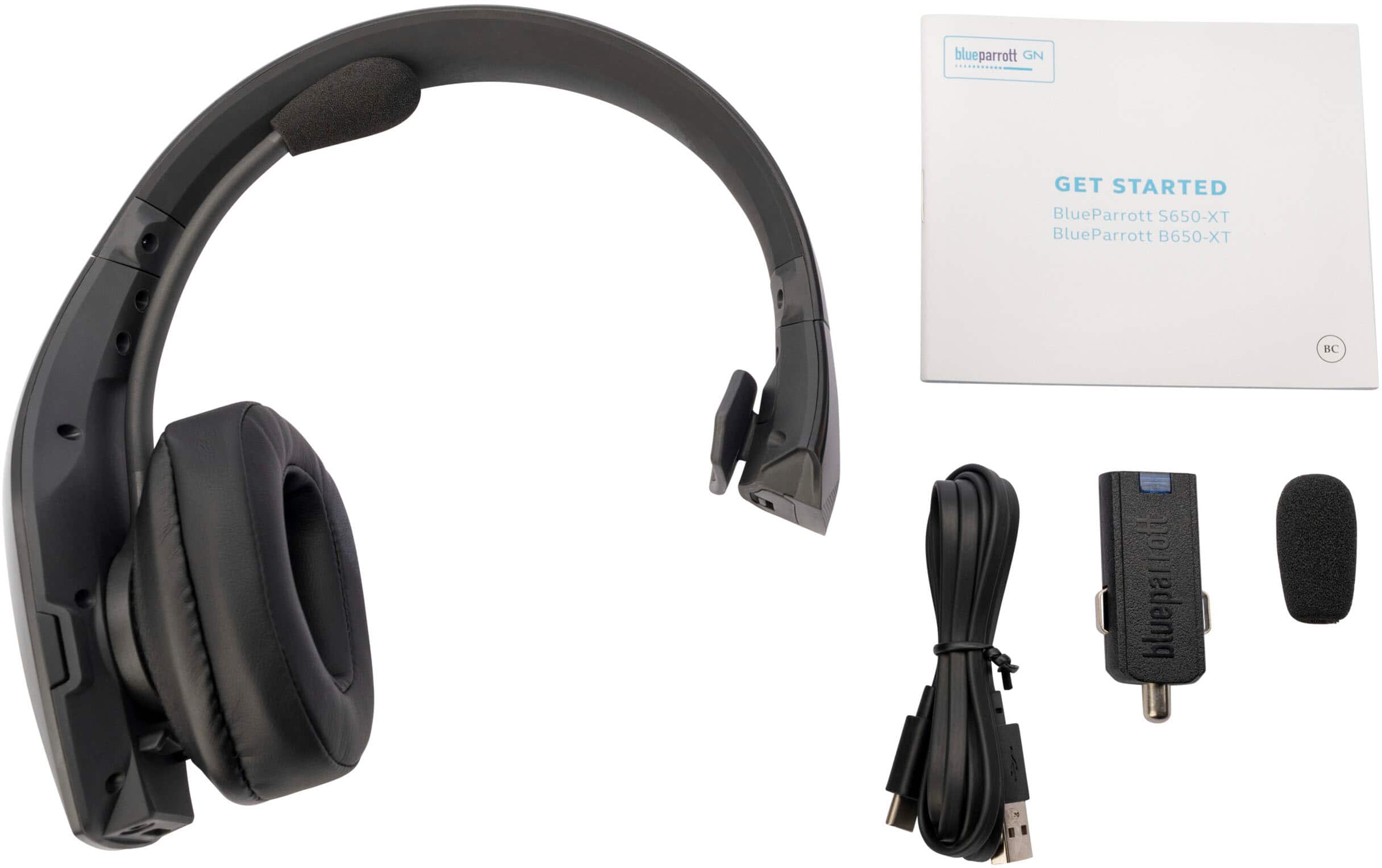 The image features a pair of BlueParrott headphones with a microphone and a manual. The headphones are designed for use with a computer or a mobile device, providing clear audio and communication. The headphones come with a USB cable for easy connectivity and a user guide for setup and usage.
