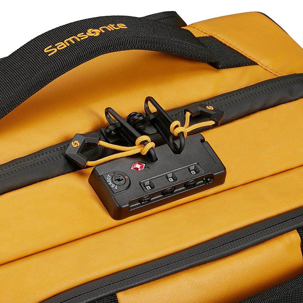 Samsonite is the brand of the yellow and black suitcase.